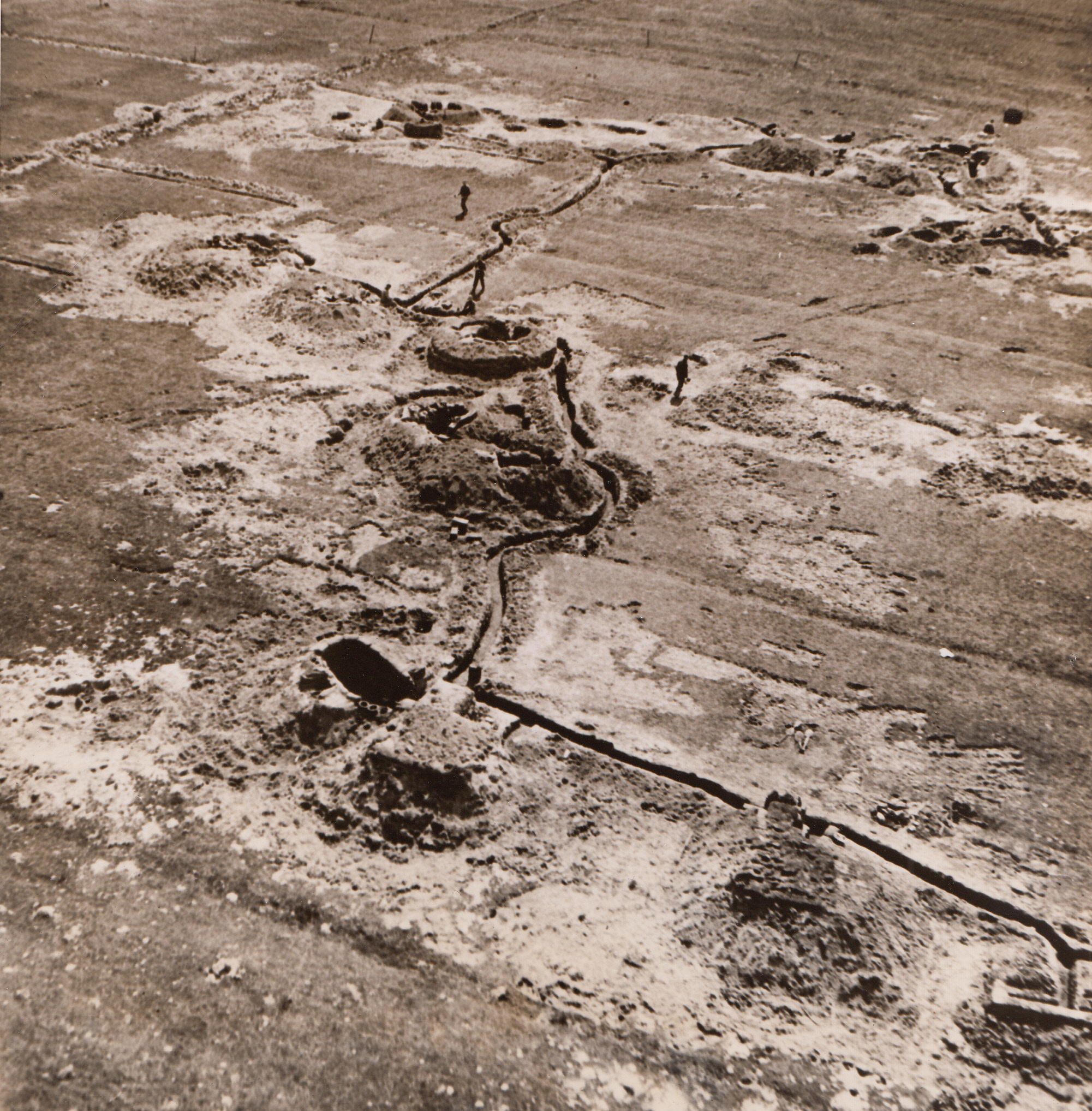 “Rest Camps” for Allies, 4/22/1944. ANZIO, ITALY – Though they may appear so, these pillboxes and crawl trenches in the British sector at Anzio are not part of the front lines, but are used by men taking a two day rest from the front. They are only 600 yards from the battle locale, but the pillboxes are protected from enemy observation by a slight rise in ground.;